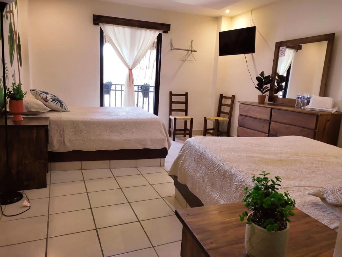 Hotel Cafenaranja Хилитла Экстерьер фото