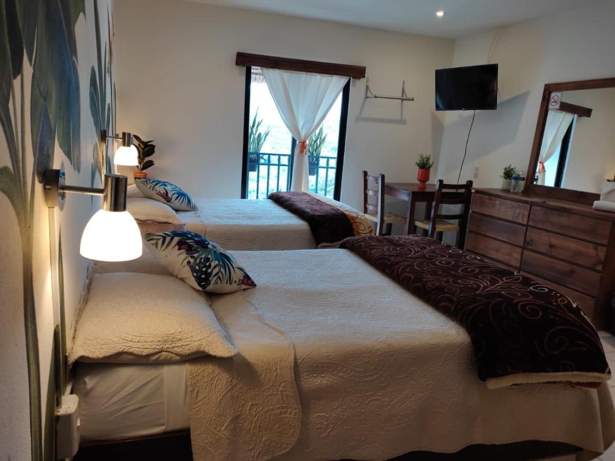 Hotel Cafenaranja Хилитла Экстерьер фото